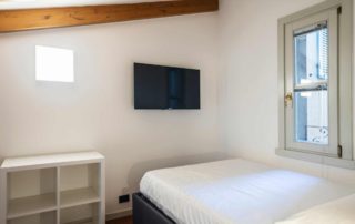 STUDIOSUITE_stanza singola 3_letto-tv_piano 4 STUDIOSUITE_stanza singola 3_letto-tv_piano 4